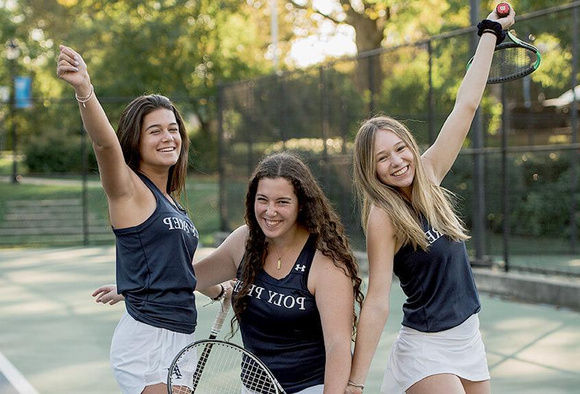 girls tennis 3 girls smiling